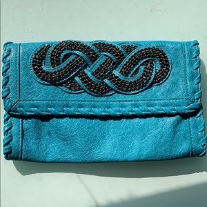 Vintage turquoise boho clutch with knot detail